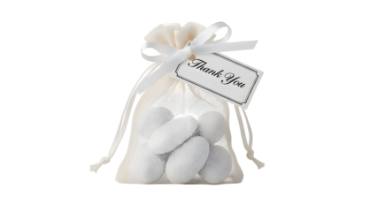 White soap hearts in a mesh bag with a thank you tag isolated on transparent background
