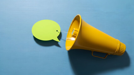 Yellow Megaphone with Speech Bubble on Blue Background