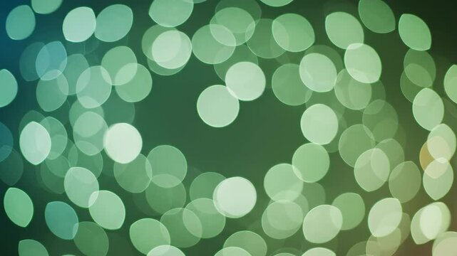 Abstract green bokeh lights shimmering in a soft blur. Festive background for St. Patrick's Day celebration. Glowing emerald and teal orbs with copy space. Cinematic light background