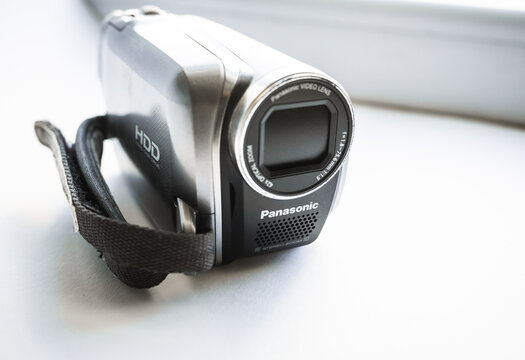 A retro Panasonic camcoder with LCD flip screen.