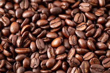 Obraz premium Roasted coffee beans macro background 