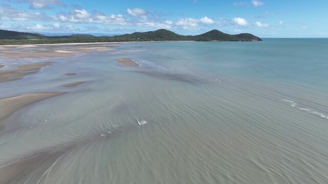 Aerial with vast panorama across low incoming tides of Australia's Ball Bay