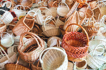 An abundance of handmade baskets, a stunning display of woven art in a variety of sizes, shapes and...
