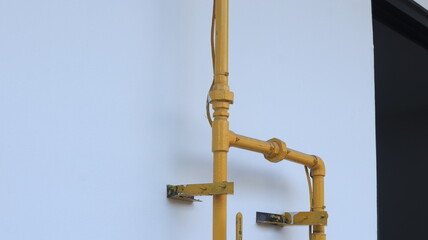 yellow gas pipe installation at home