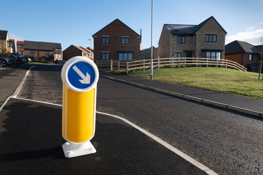 Quiet modern housing estate with typical modern houses. New residential estate with modern houses. Peaceful new housing development 