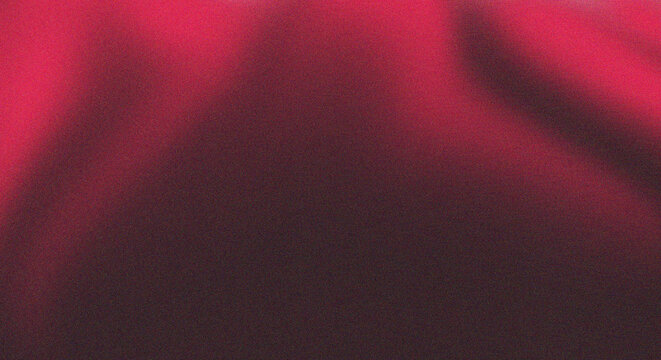 A vibrant abstract background featuring a textured blend of red black and subtle hints of purple hues