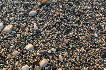 Top View of Colorful Wet Sea Pebbles on the Beach