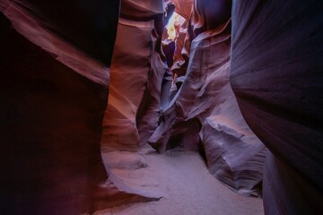 Deep slot canyon passage with sand floor in Antelope Canyon © Aquarius