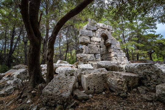 Ancient stone arch and ruins in the forest of Phaselis, Turkey