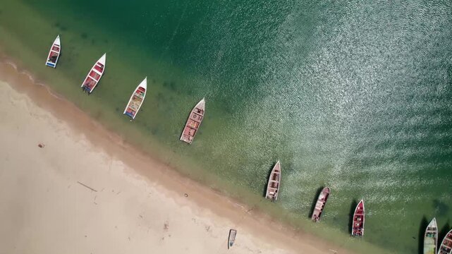 Top down aerial view of fishing boats on tropical beach Venezuela