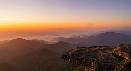 Fototapeta premium dawn over layered mountain ranges