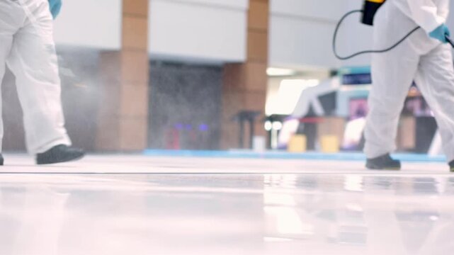Professional Disinfection Team Sanitizing Public Areas, Hygiene and Safety Concept