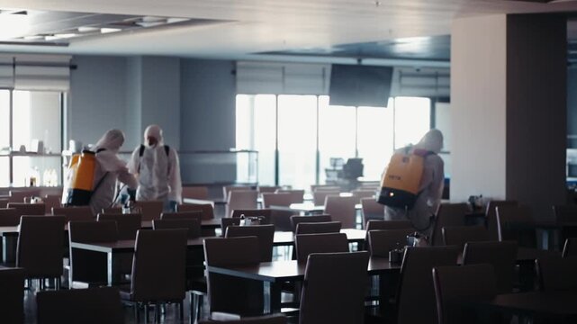 Professional Disinfection Team Sanitizing Public Areas, Hygiene and Safety Concept