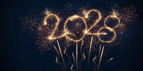 happy new year, new year's eve, silvester, new years eve, sparklers celebration greeting card, new year card - Year 2028 in sparkler font and firework fireworks pyrotechnic, blue night sky background © Corri Seizinger