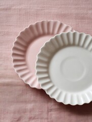 Pastel Fluted Plates on Linen Background
