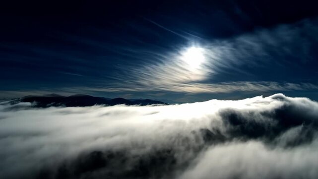 Moonlit scene of a full moon casting a glow over mist-covered mountains, creating a serene and tranquil atmosphere. the night sky is adorned with wispy clouds, enhancing the mystical and calm nature o