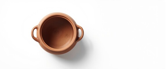 Isolated empty cooking pot in closeup against white backdrop