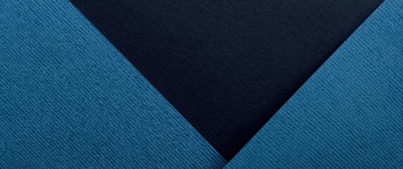 Macro shot of craft sky texture featuring navy blue and black shades, paper background, vintage abstract denim cardboard with geometric shapes and gradient, felt backdrop closeup