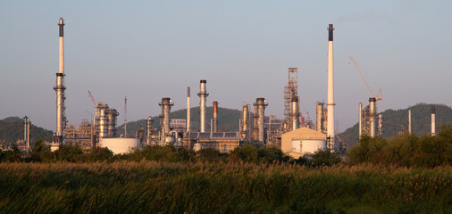 Oil and Gas Industrial zone,The equipment of oil refining,Close-up of industrial pipelines of an oil-refinery plant,Detail of oil pipeline with valves in large oil refinery.