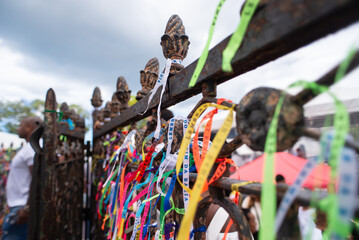 Ribbons of Senhor do Bonfim on an Iron Fence
