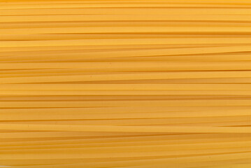 Background of dry spaghetti pasta long noodles texture