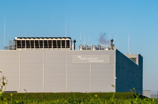 hyper scale AI cloud Datacenter building on a sunny day