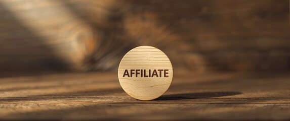 Small wooden circle featuring the word AFFILIATE