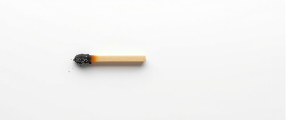 Obraz premium White background featuring burnt matches, textured, isolated wood, light, and fire theme
