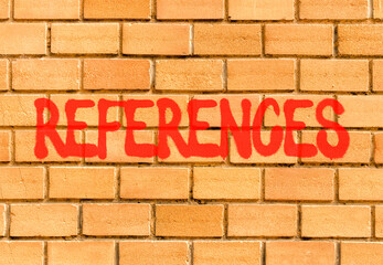 References or reference symbol. Concept word References on beautiful big brown brick wall. Beautiful big brown brick wall background. Business references or reference concept. Copy space.