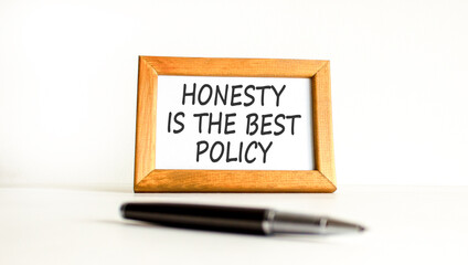 Honesty is the best policy symbol. Concept words Honesty is the best policy on beautiful wooden picture frame. Beautiful white background. Business honesty is the best policy concept. Copy space.