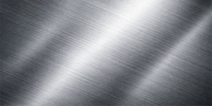Polished silver brushed metal texture background with a shiny industrial chrome plate surface featuring a grey metallic aluminum material pattern and light reflection on a stainless steel sheet