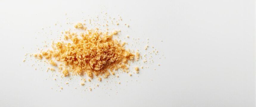 Isolated bread crumbs and crushed rusk bread crumbs for nuggets, panko on white background, top view, food and wheat ingredient