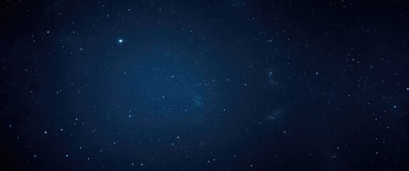 Naklejka premium Night sky starry background featuring noise, grains, and soft focus due to slow shutter and high ISO