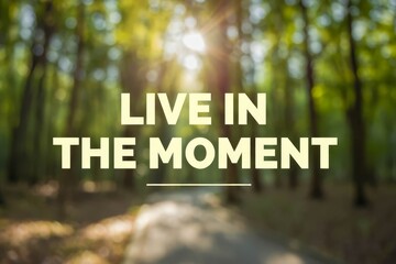 Inspirational motivation quote with blurred background. LIVE IN THE MOMENT.