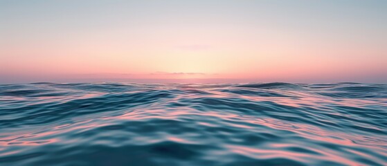 A serene ocean view at sunset, with gentle waves reflecting soft pastel colors in the sky.