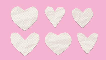 Set of different shaped white cutout hearts of crumpled paper. Cut hearts in pop art style with torn edge. Vintage realistic elements with wrinkled paper texture for Valentines Day collage. Vector
