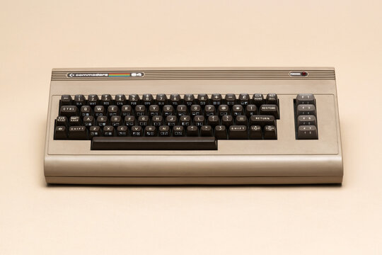 Vintage Commodore 64 home computer with classic keyboard design, iconic 8-bit hardware and retro computing aesthetic