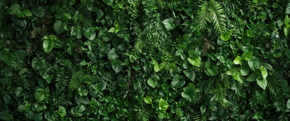 Obraz premium Background featuring a green artificial plant wall panel in closeup