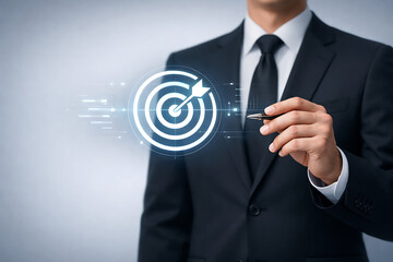 Businessman pointing pen at glowing holographic target in futuristic digital data grid