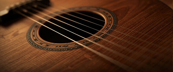 Obraz premium Strings of a guitar with a guitar background