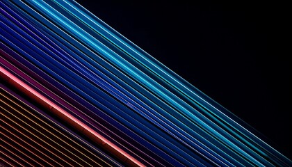 Diagonal parallel lines in vibrant gradient colors on black background suggesting motion and energy.