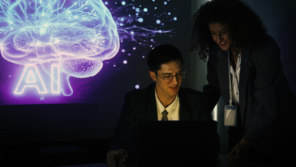 Ai and Business. Tech Startup team discussing and using artificial intelligence or digital Ai assistant.  Business innovation AI technology collaboration and ideas for future. Tech brainstorming idea