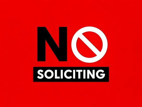 No Soliciting Warning Sign with Prohibition Symbol on Red Background