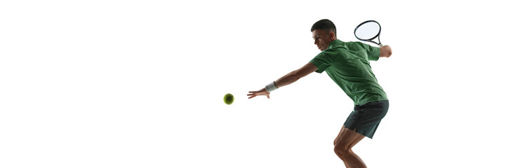 Tennis player reaching ball with extended arm isolated on white background. Concept of reaction speed training, court coverage drills, tennis movement practice, athletic performance content. Banner