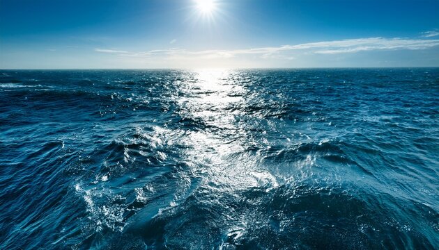 Superficie Del Mar Tomada De Forma Cenital En El Oceano Con Los Reflejos Del Sol Sobre Sus Aguas Onduladas Por El Viento