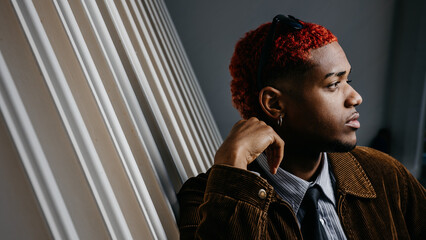 Profile portrait of a black man with thoughtful look © EvaHM