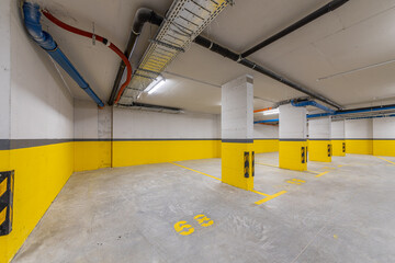 Naklejka premium Underground Parking Garage. Modern Infrastructure for Mobility, Safety, and Urban Planning Concepts