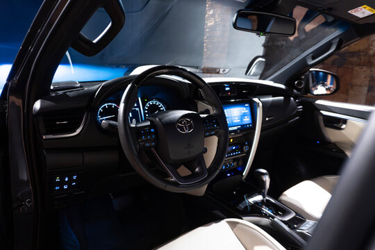 Toyota SW4 Diamond interior cockpit view, Luxury SUV dashboard through open door