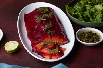 Cured salmon gravlax with dill, a classic Scandinavian gourmet appetizer.