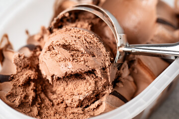 Scooped chocolate ice cream or chocolate ice cream background